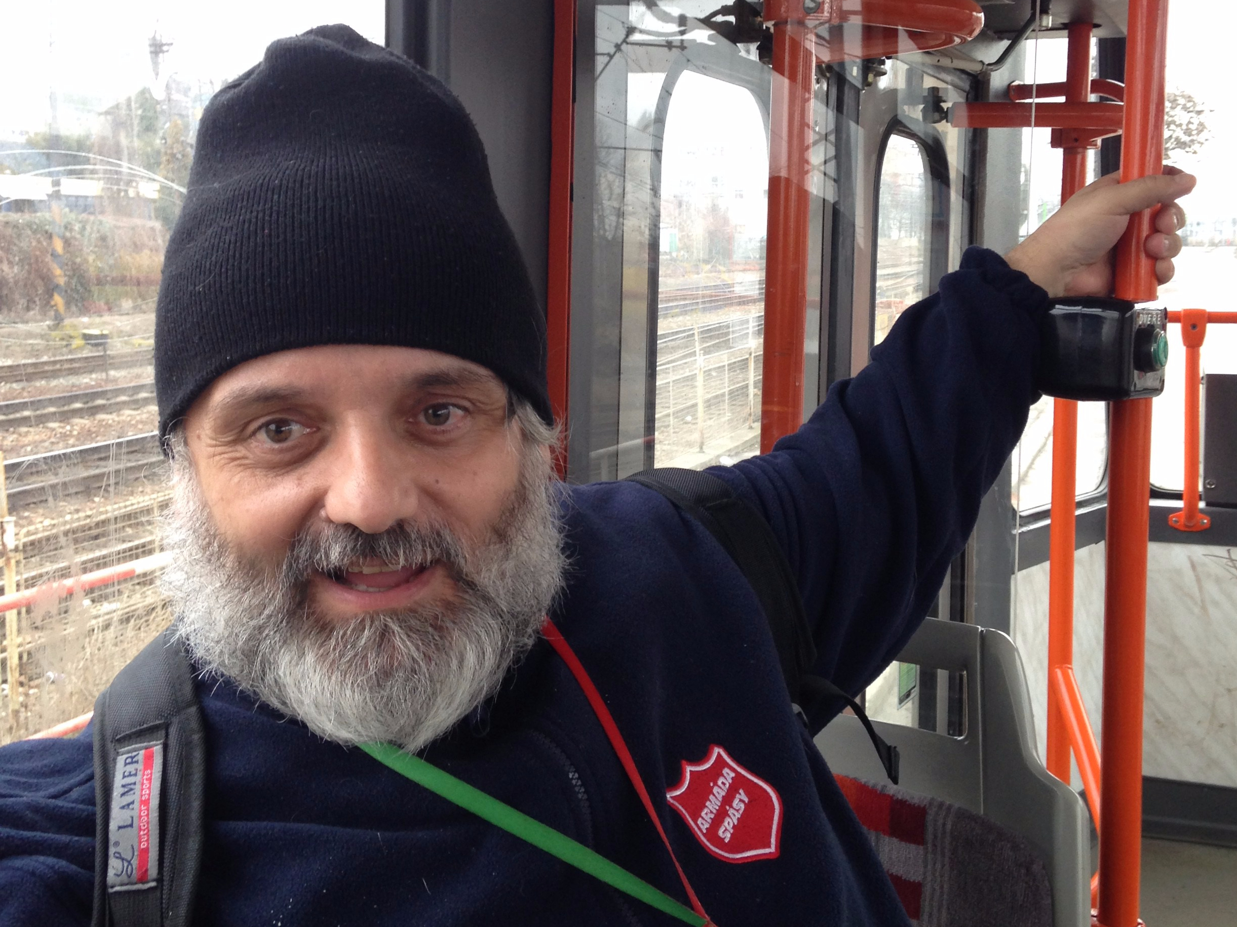 Pragulic guide Robert Pochop rides the tram in Prague.